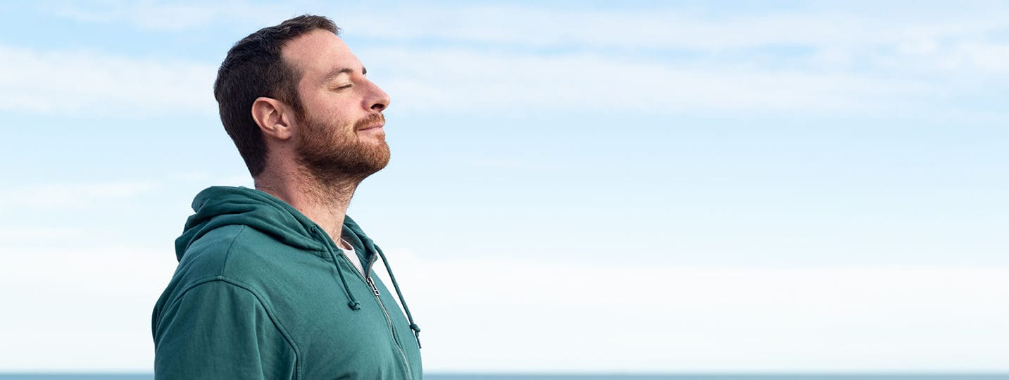 Bankruptcy: Relaxed man breathing fresh air.